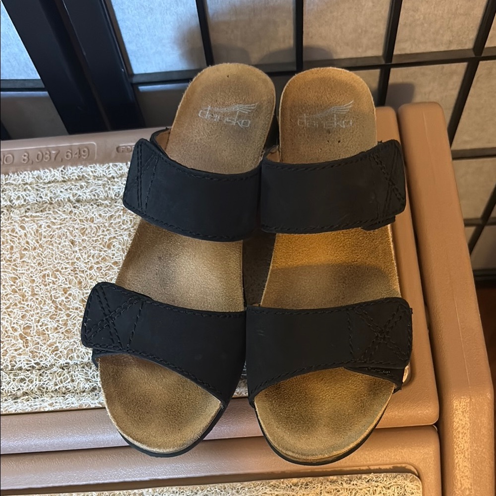Dansko Black and Tan Sandals with Two-Strap Design